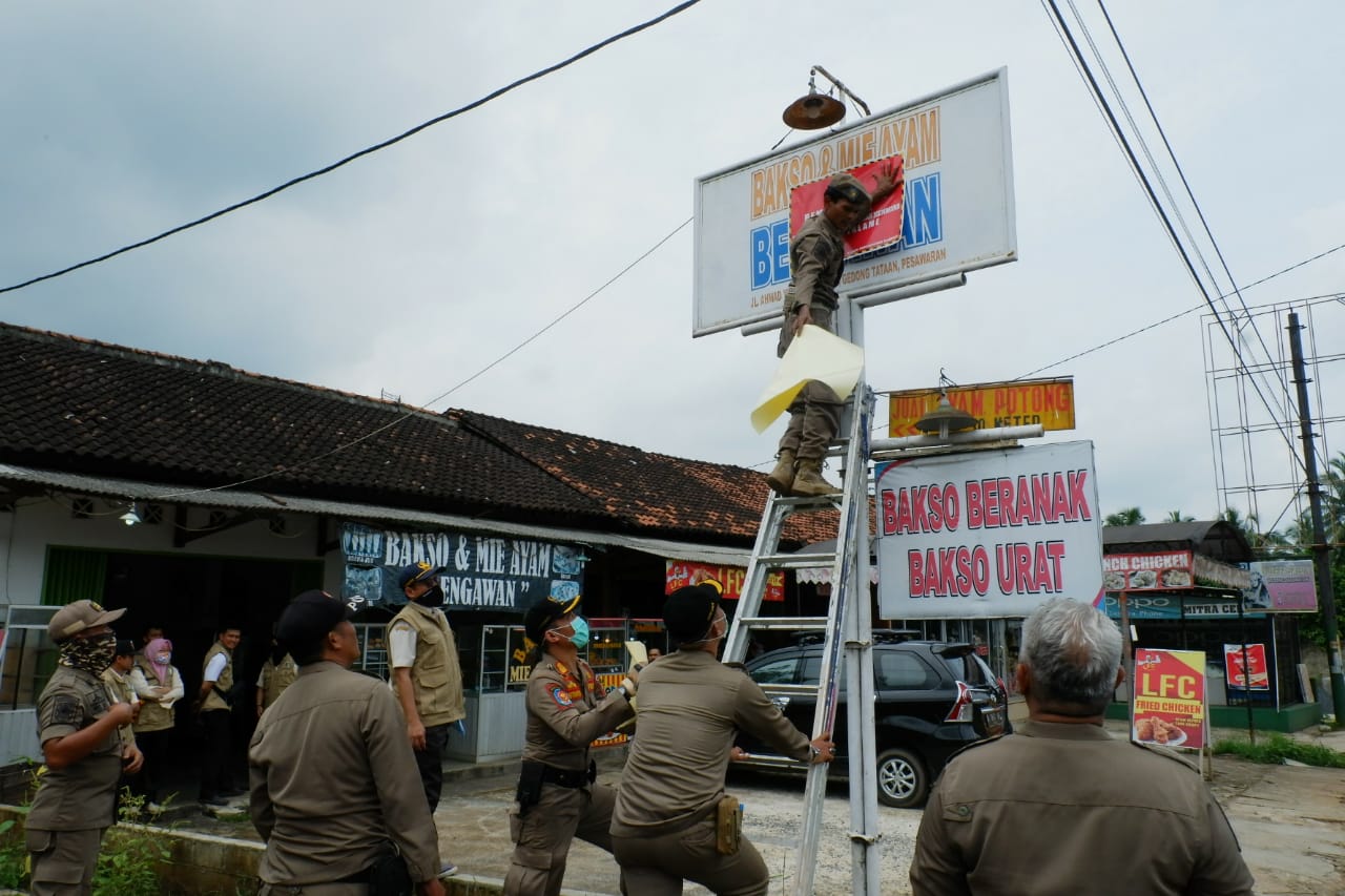 Bapenda Beri Label Penunggak Pajak